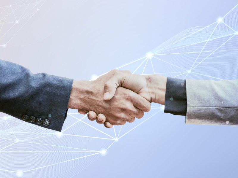 Partnership handshake innovation corporate business concept